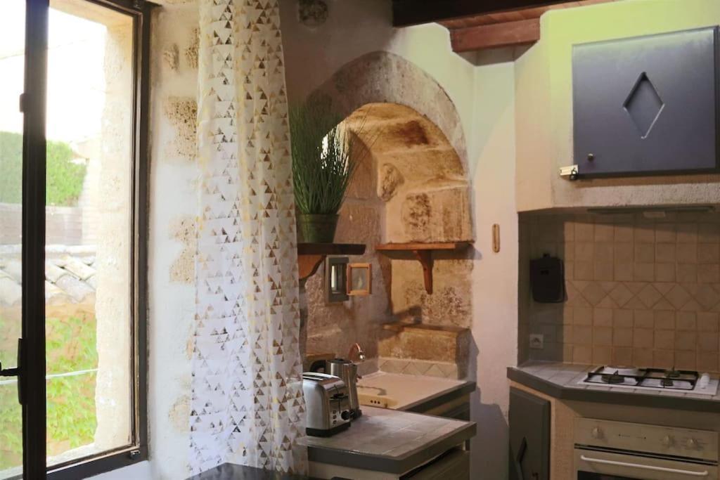 Apartamento Entre Uzes Et Le Pont-Du-Gard Le Logis D'Autrefois Castillon-du-Gard Exterior foto